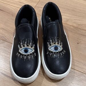Kurt Geiger Black Slip-On Sneakers with Blue Embroidered Eye